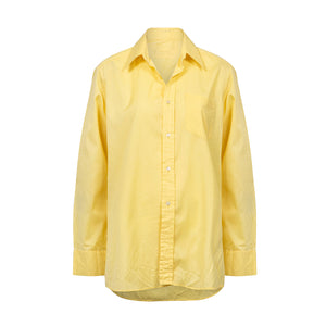 Bright yellow shirt.