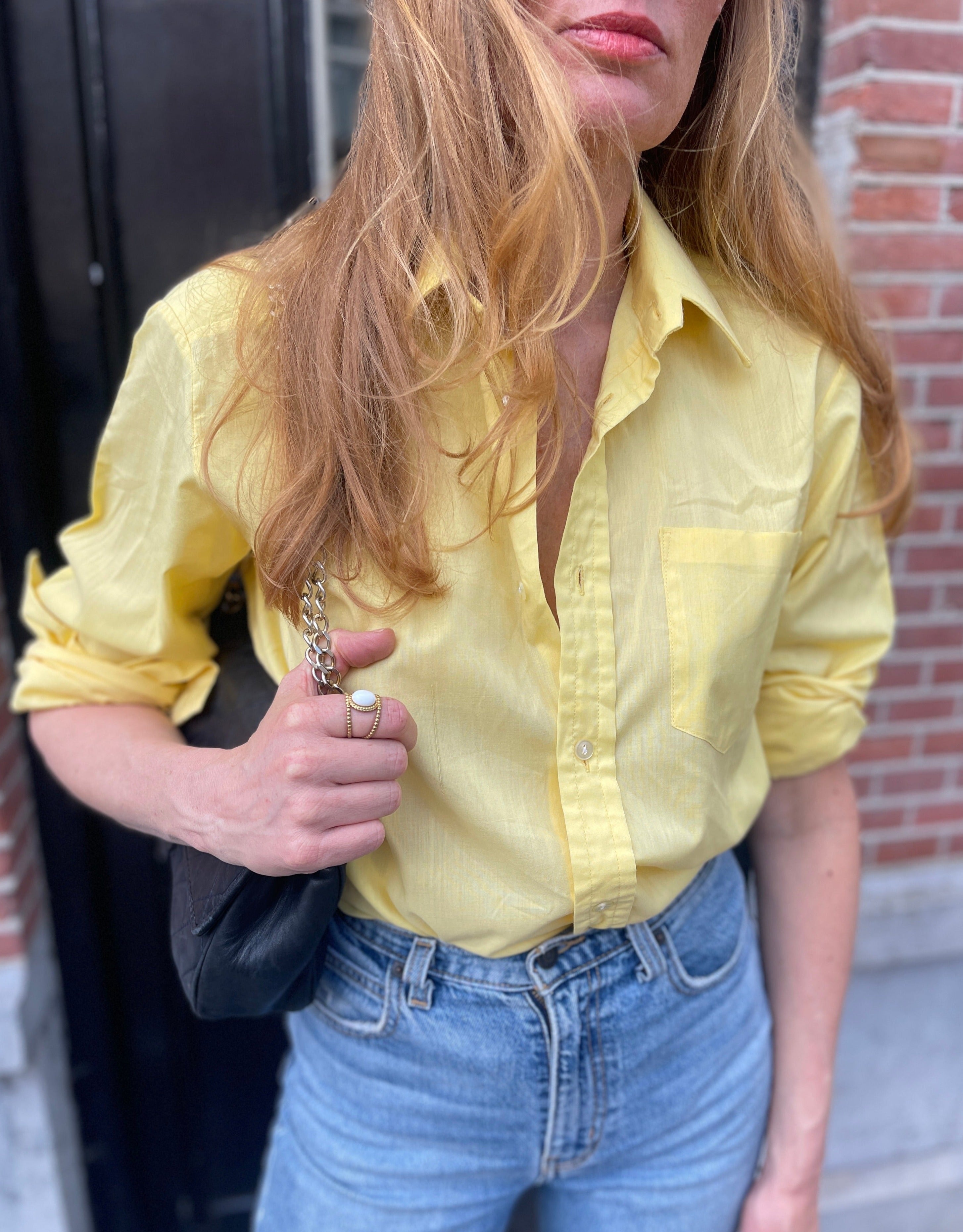 Bright yellow shirt.