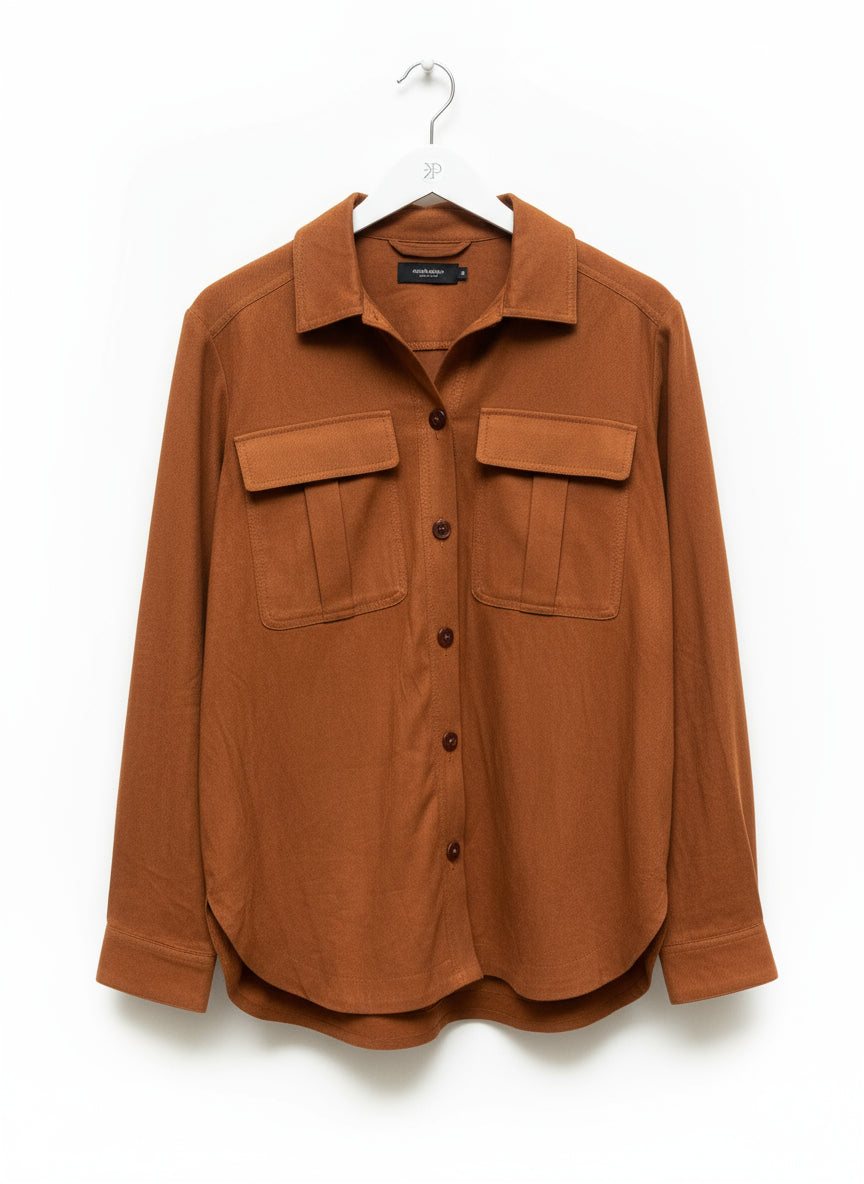 Rust brown belted shirt by Claudia Sträter.