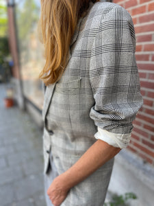 Checked light grey blazer by Yves Saint Laurent.