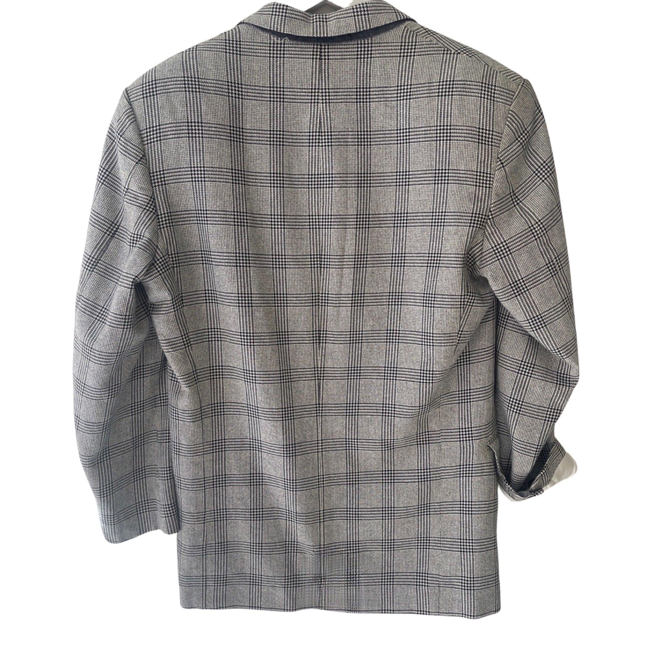 Checked light grey blazer by Yves Saint Laurent.
