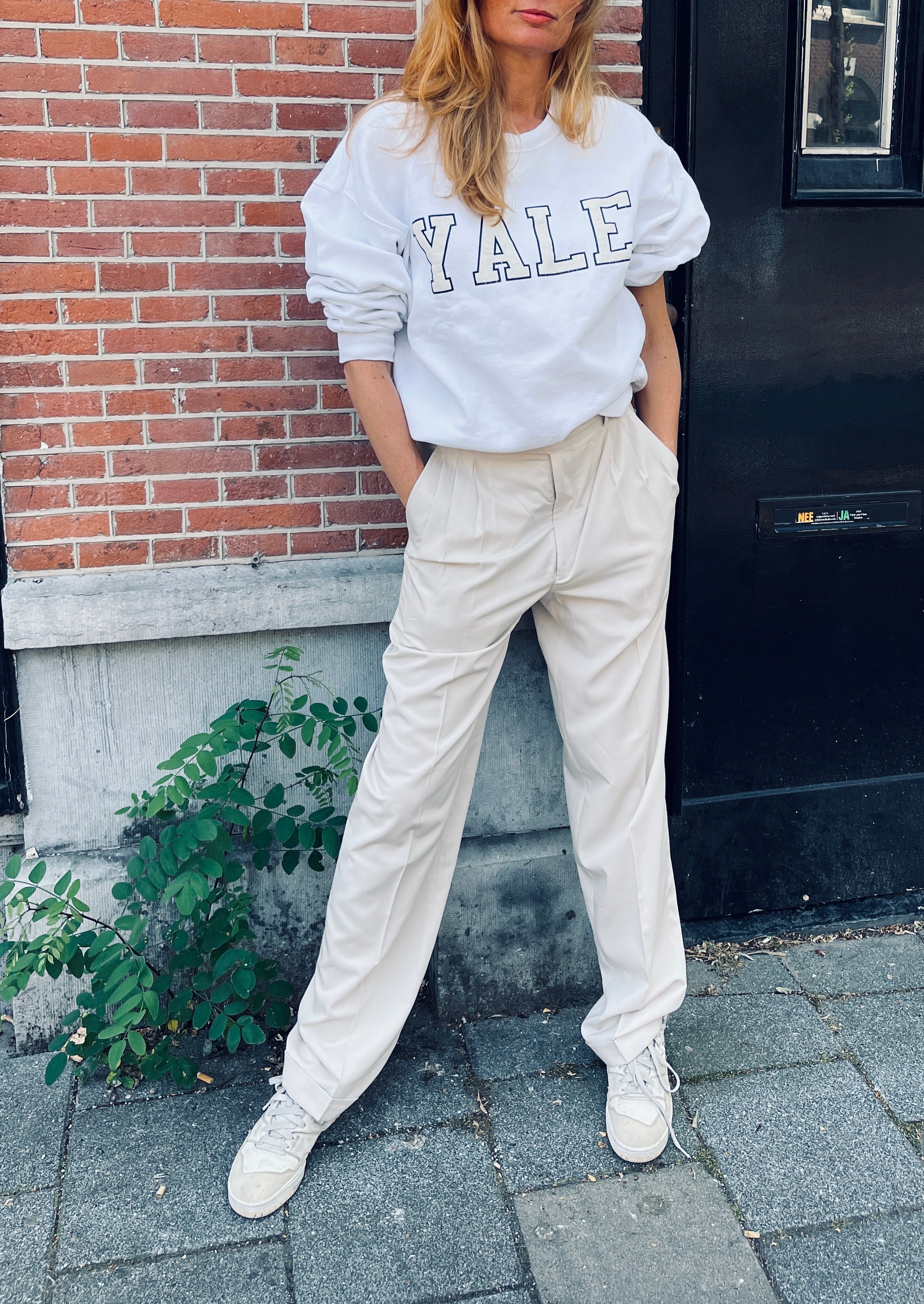 white Yale college sweatshirt