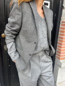 Grey herringbone blazer.