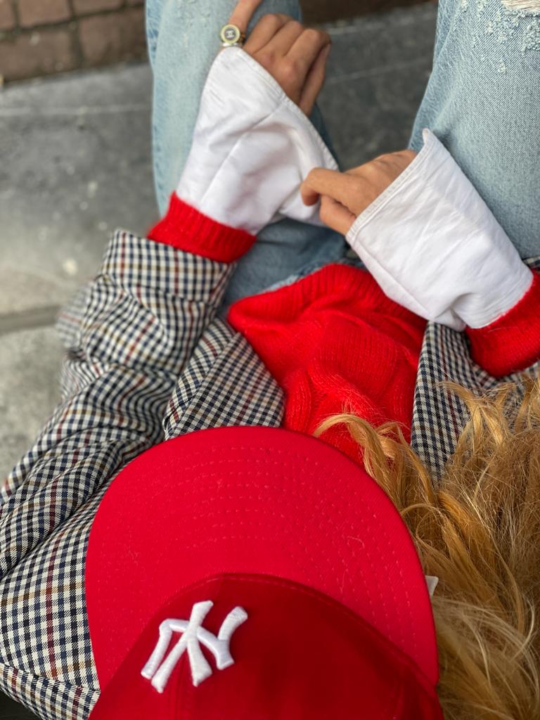 Bright red sweater by Luisa Cerano.