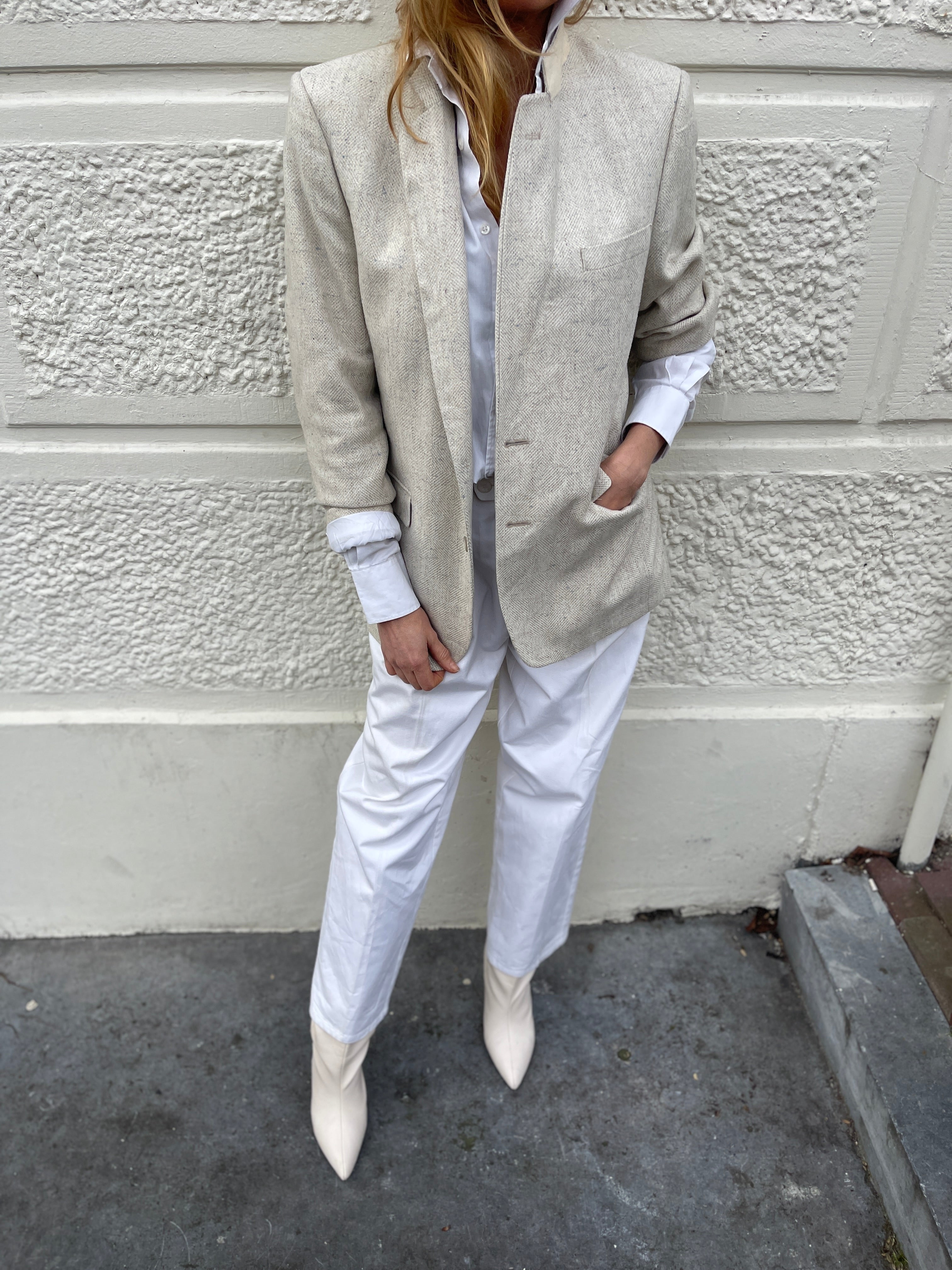 Cream tweed blazer.