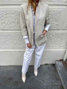 Cream tweed blazer.
