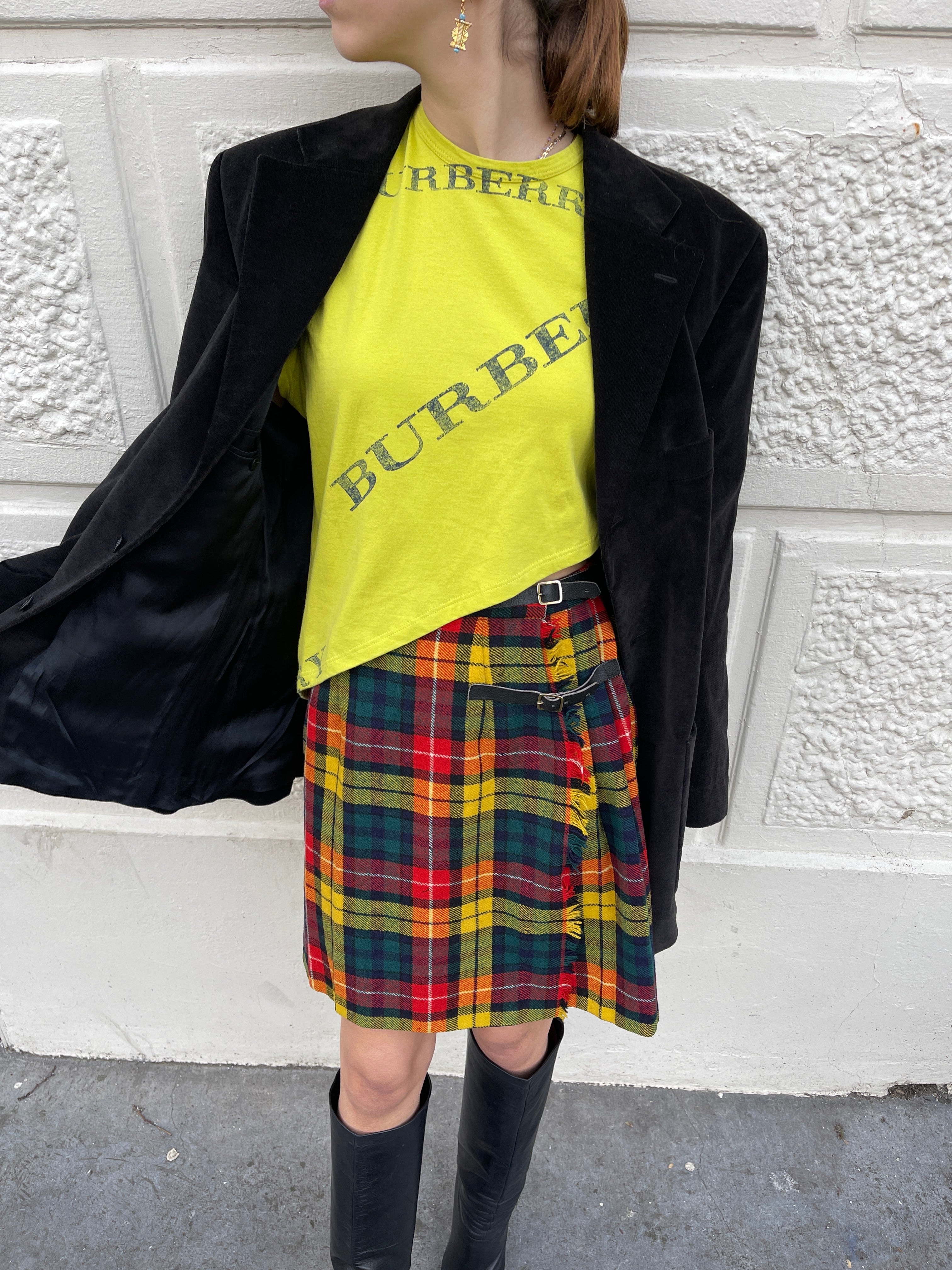 Asymmetric yellow Burberry tee.