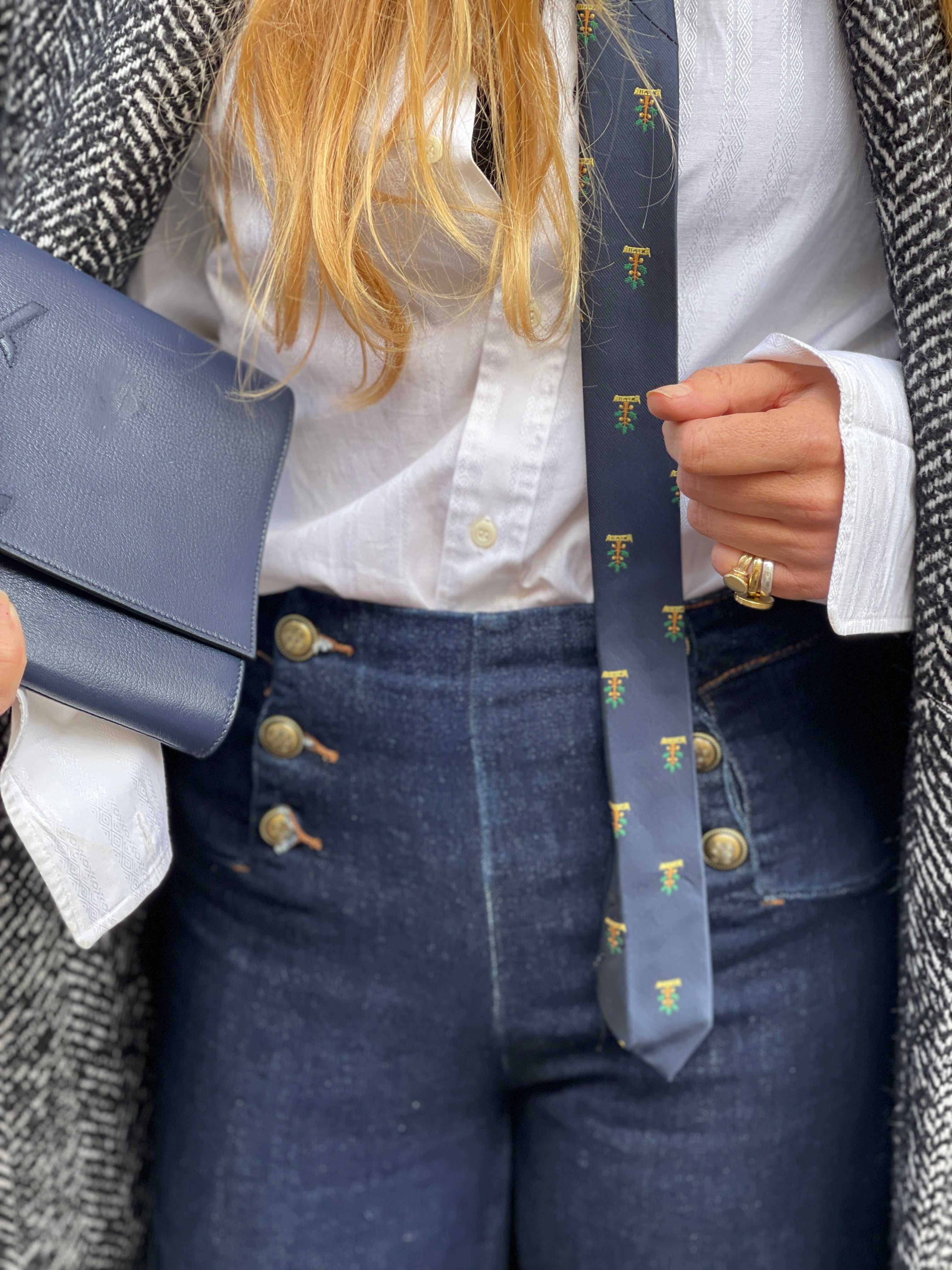 "Belle du jour" navy clutch by Yves Saint Laurent.