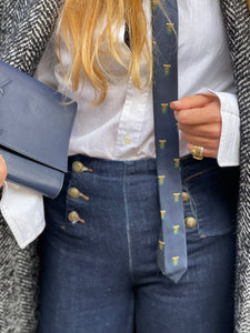 "Belle du jour" navy clutch by Yves Saint Laurent.