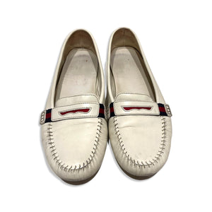 White leather loafer by Gucci.