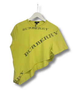 Asymmetric yellow Burberry tee.