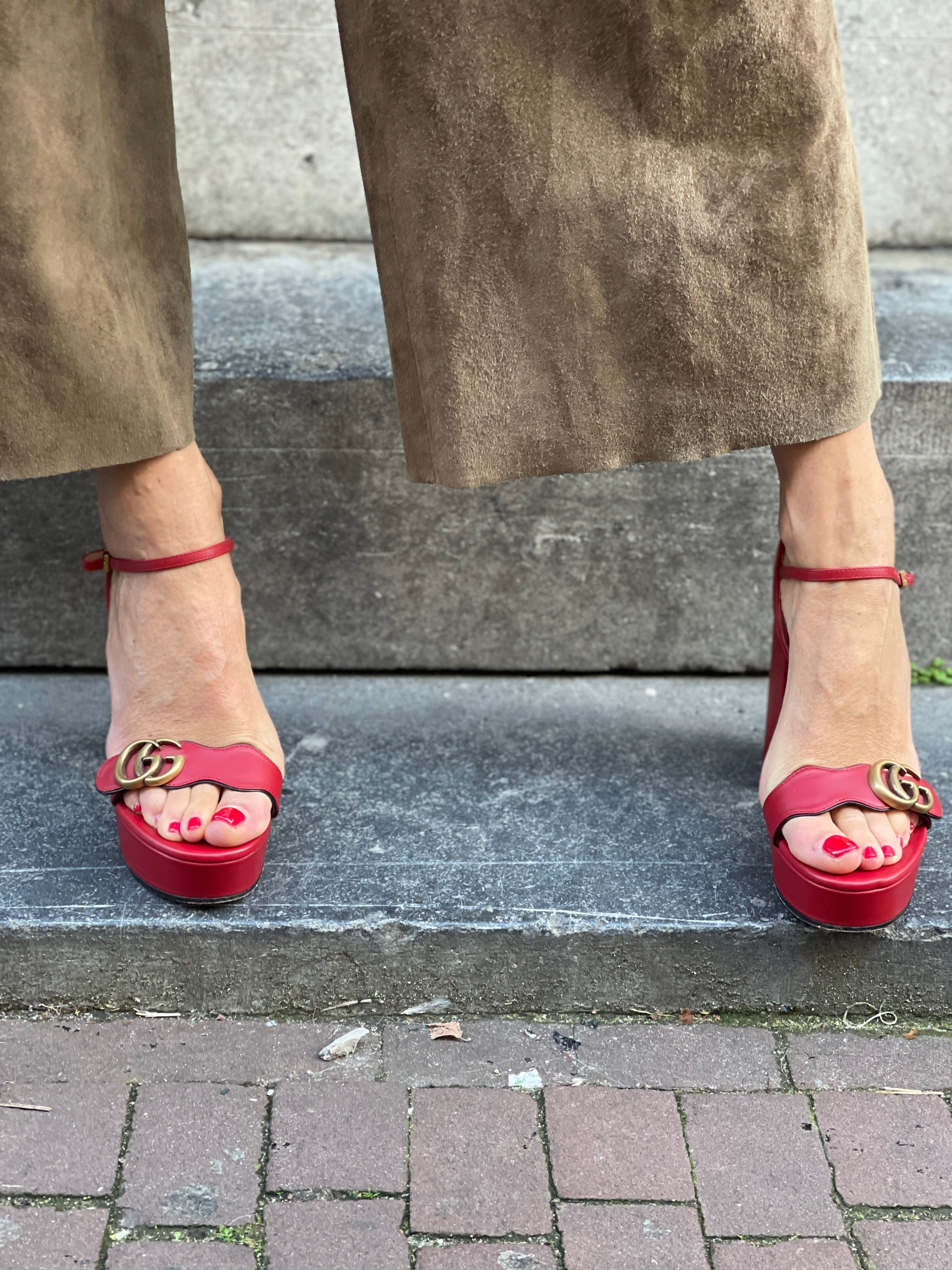 Gucci red marmont platform sandal.