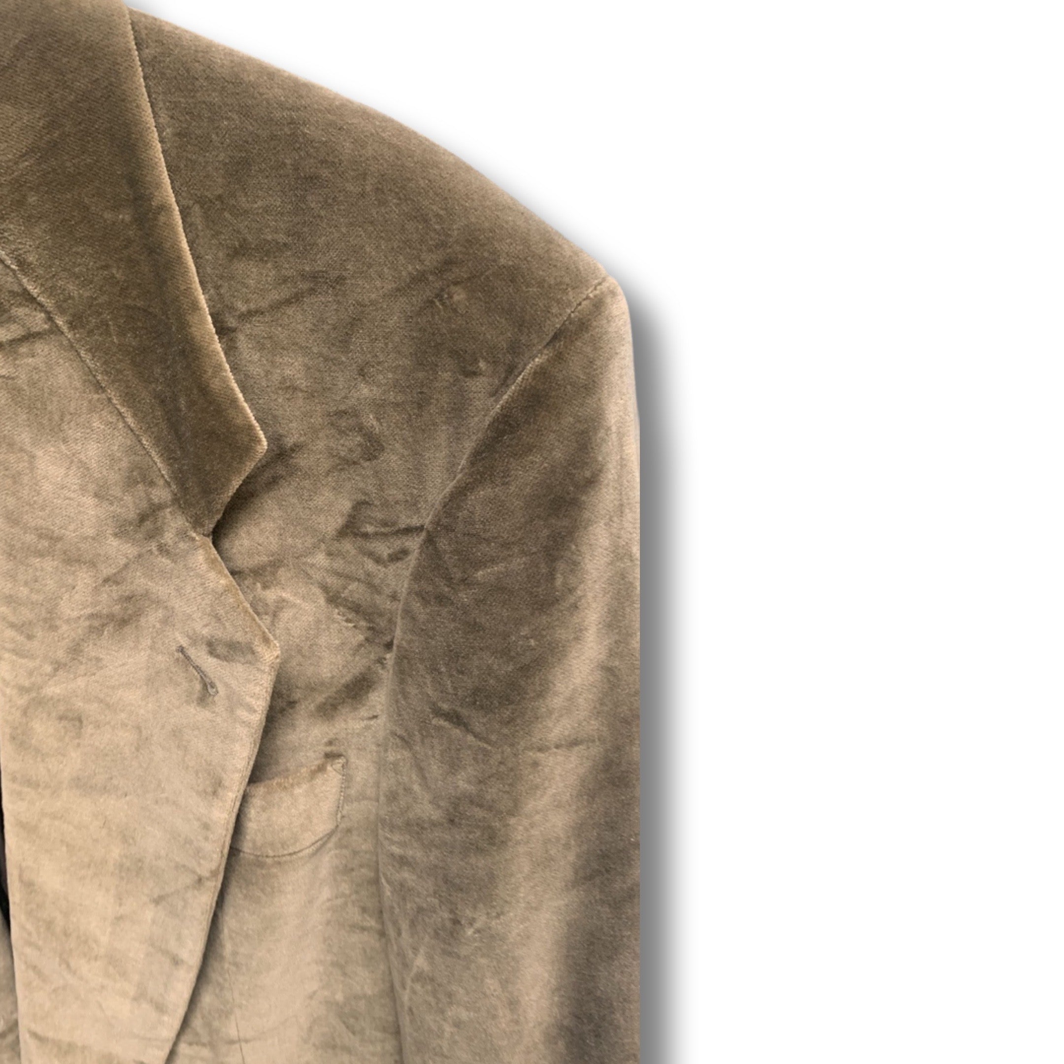 Velour green blazer by Hugo Boss.