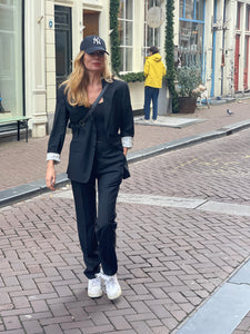 Black blazer by Cantanelli.