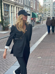 Black blazer by Cantanelli.