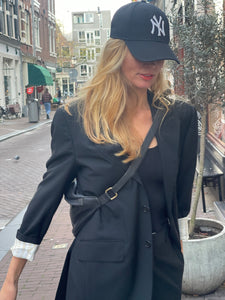Black blazer by Cantanelli.