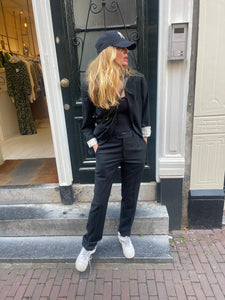 Black blazer by Cantanelli.