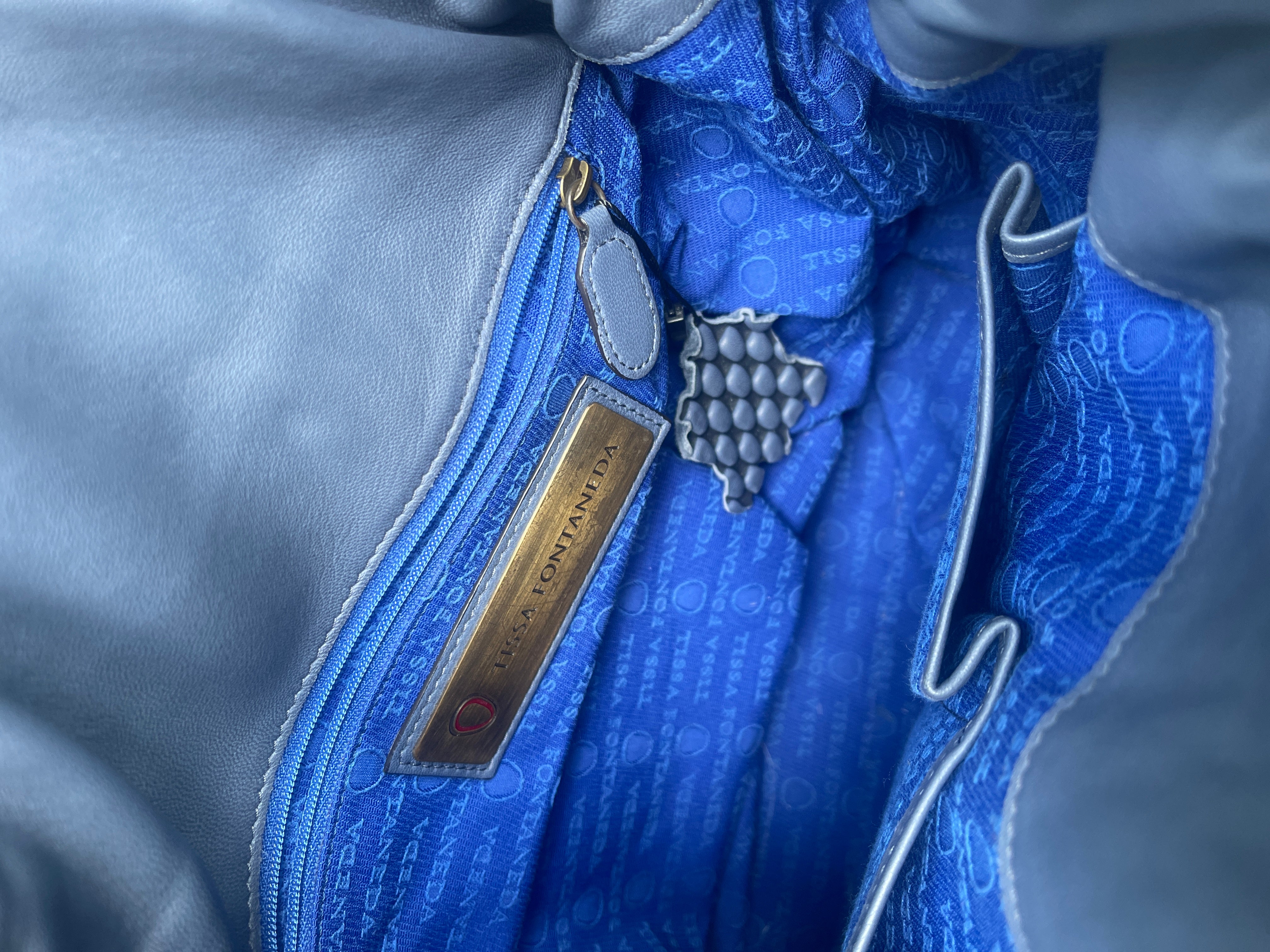 Tissa Fontaneda blue leather bag.