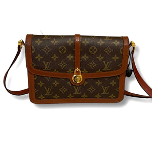 Cross body monogram bag by Louis Vuitton.