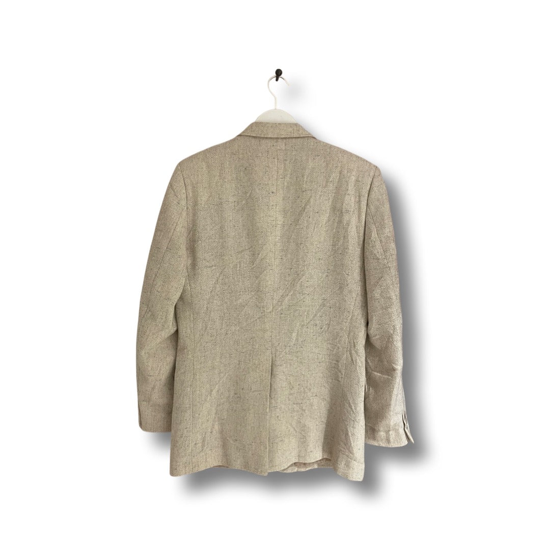 Cream tweed blazer.