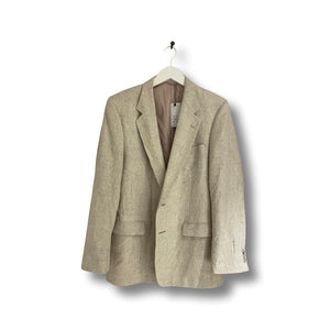 Cream tweed blazer.