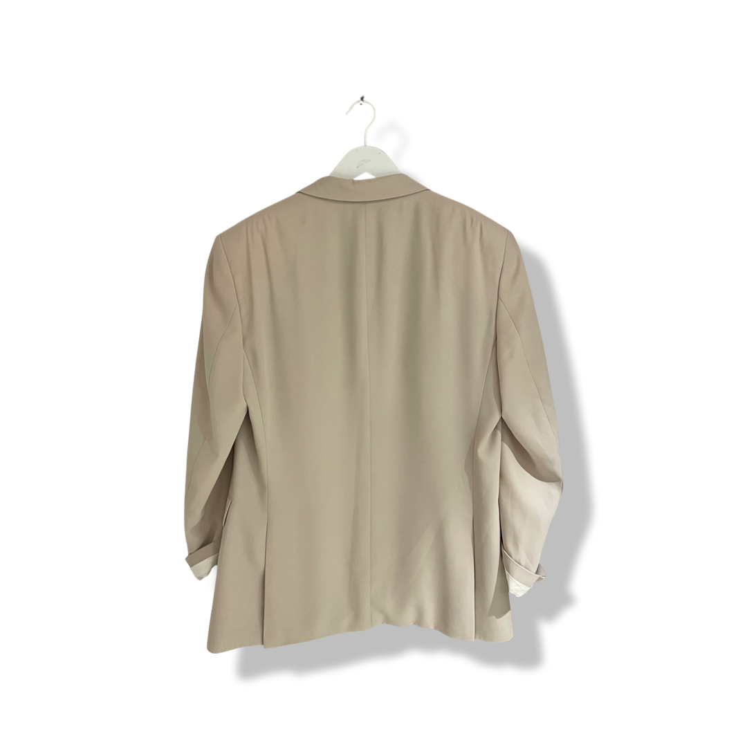 Beige suit by YSL.