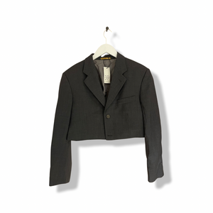 Grey YSL skirt suit.
